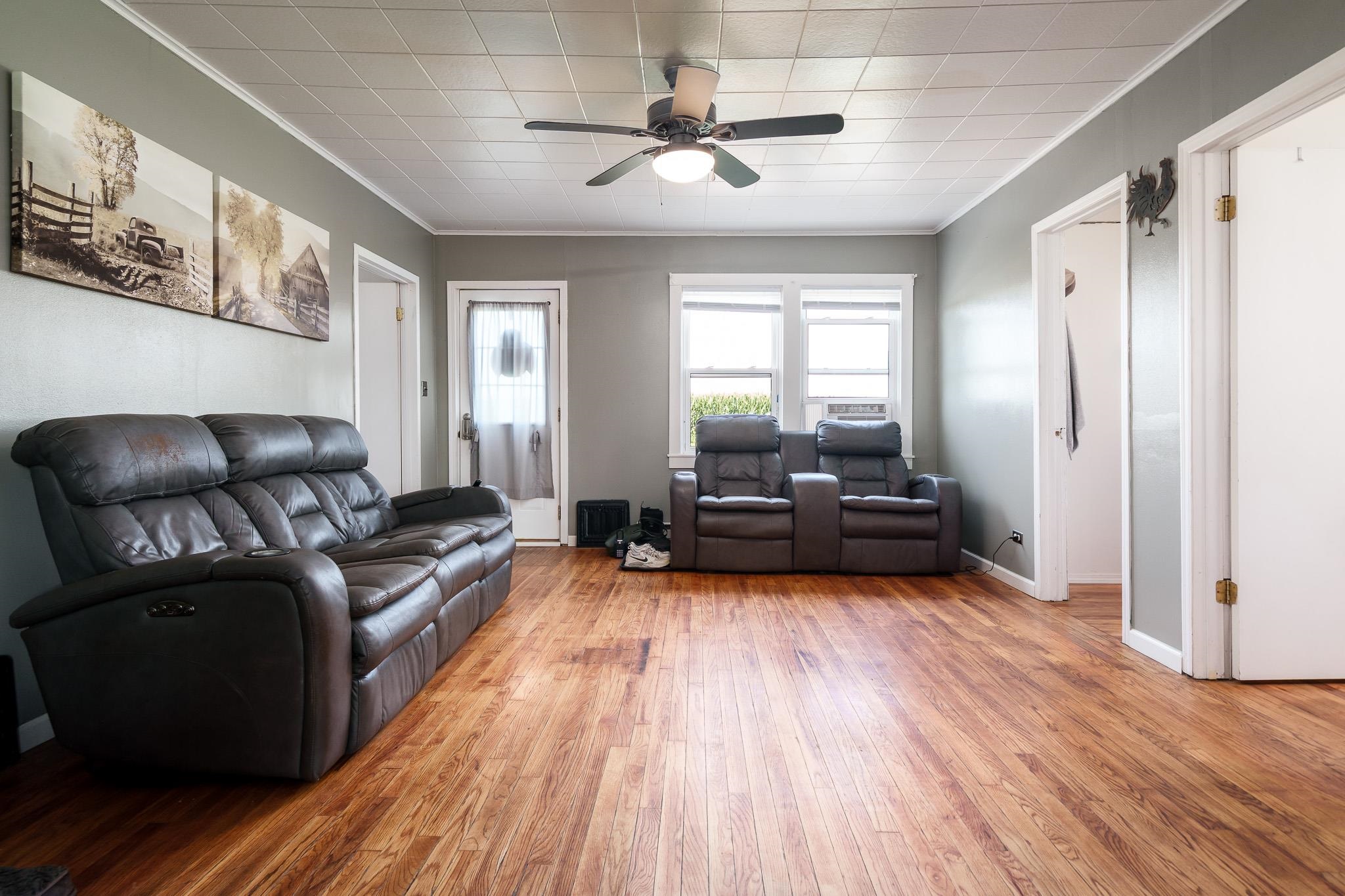 3021 North Dakota Road Freeport, IL 61032 - Photo 21 of 44 a living room with furniture and a wooden floor