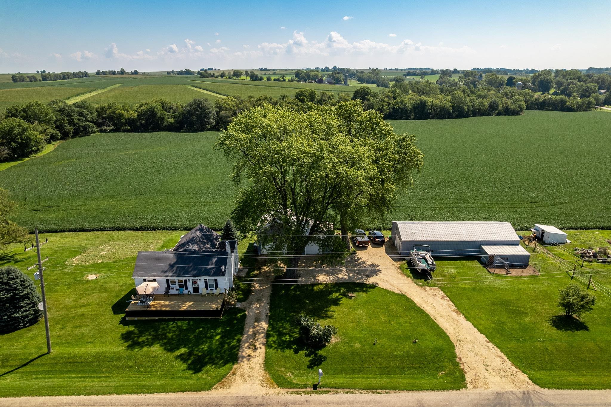 3021 North Dakota Road Freeport, IL 61032 - Photo 3 of 44 an aerial view of a house with a yard basket ball court and outdoor seating