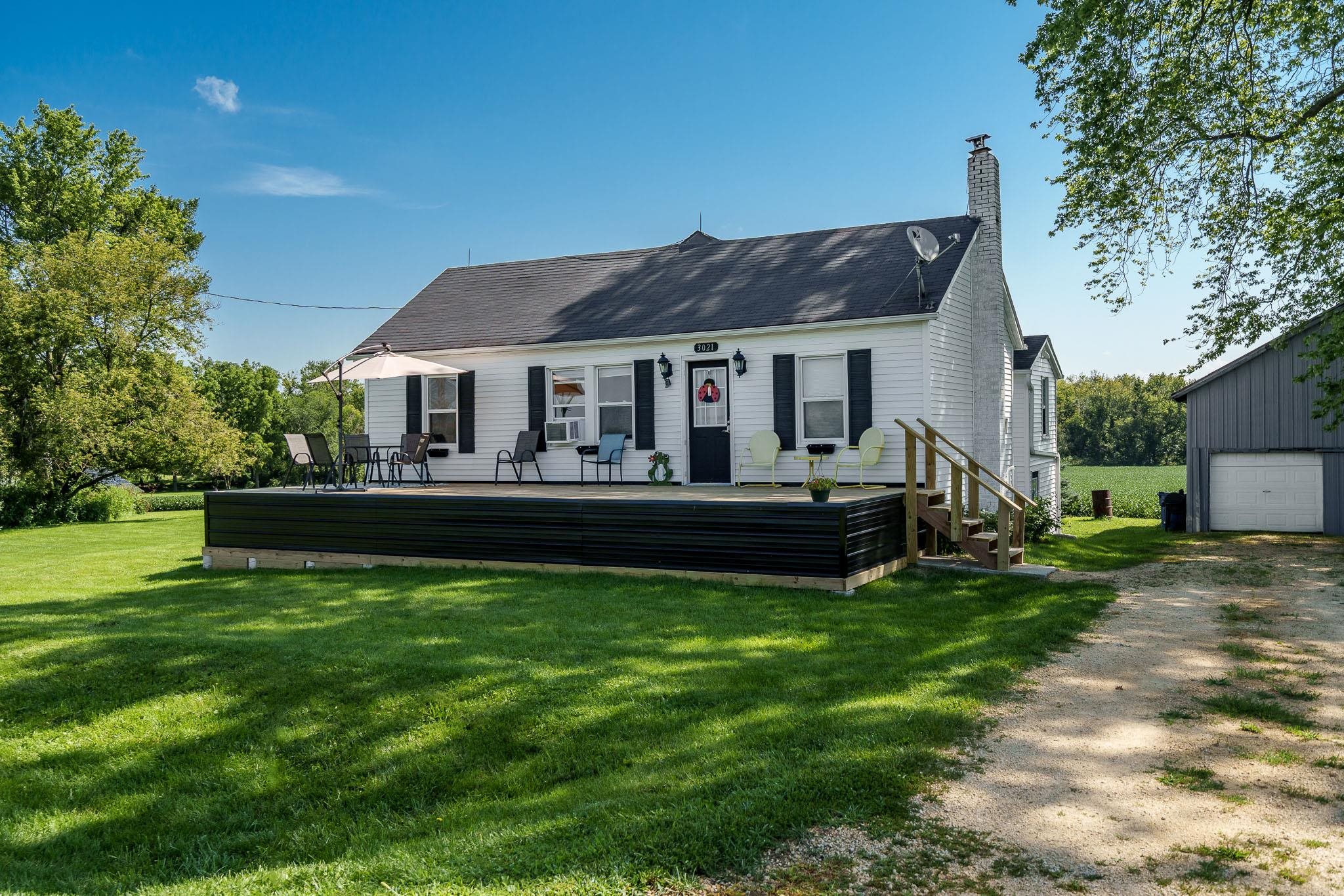 3021 North Dakota Road Freeport, IL 61032 - Photo 5 of 44 a view of a house with a yard and sitting area