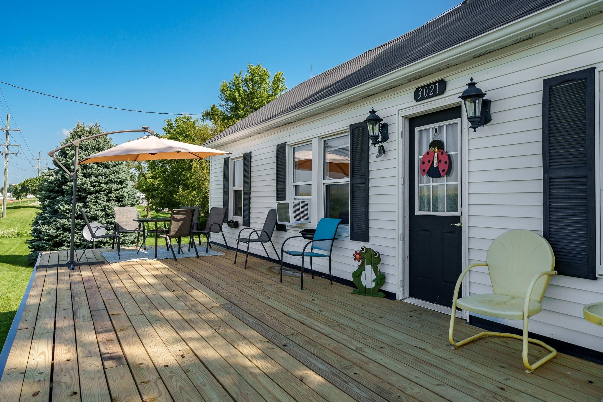 3021 North Dakota Road Freeport, IL 61032 - Photo 6 of 44 a front view of a house with patio outdoor seating