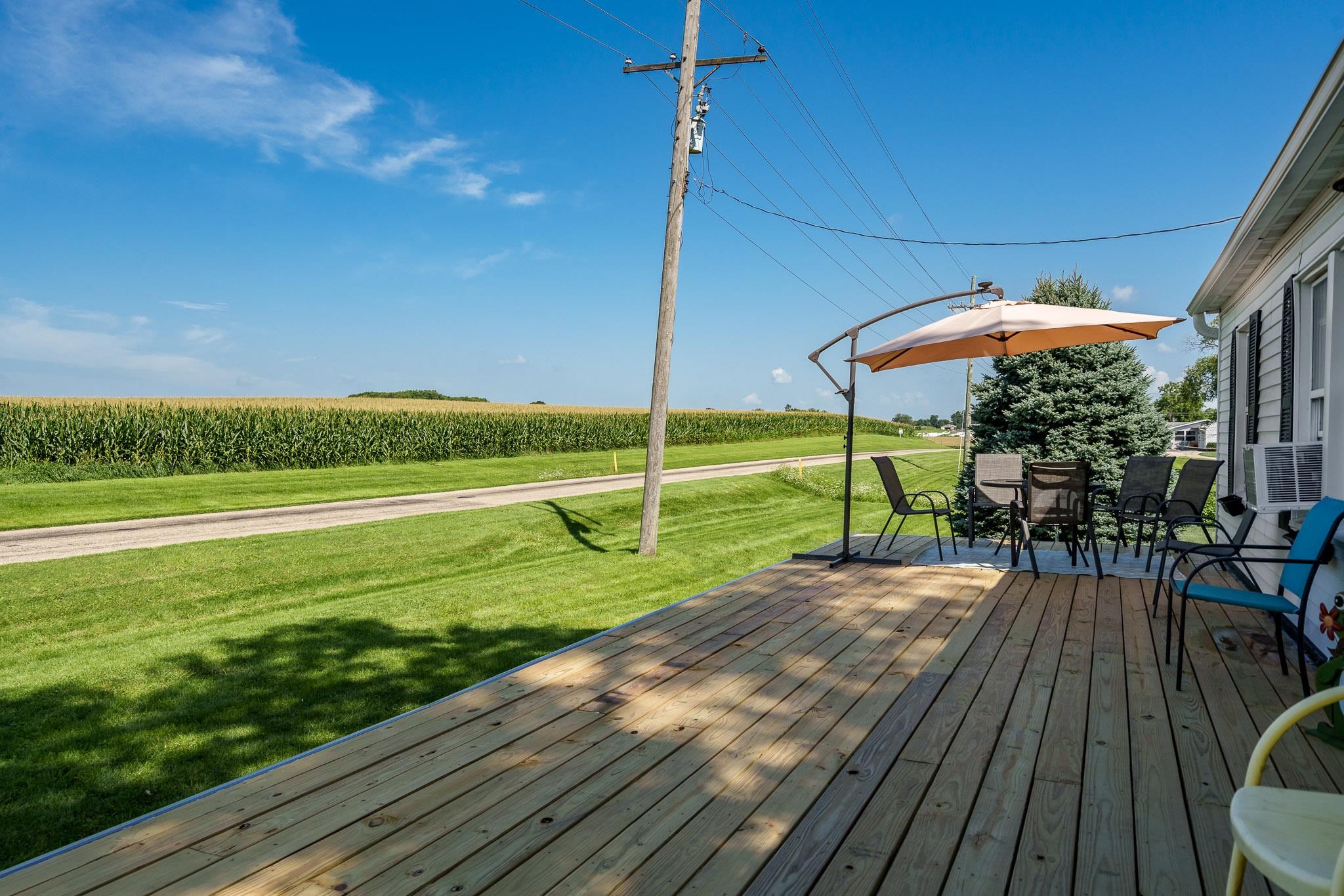 3021 North Dakota Road Freeport, IL 61032 - Photo 10 of 44 a view of a deck with a big yard