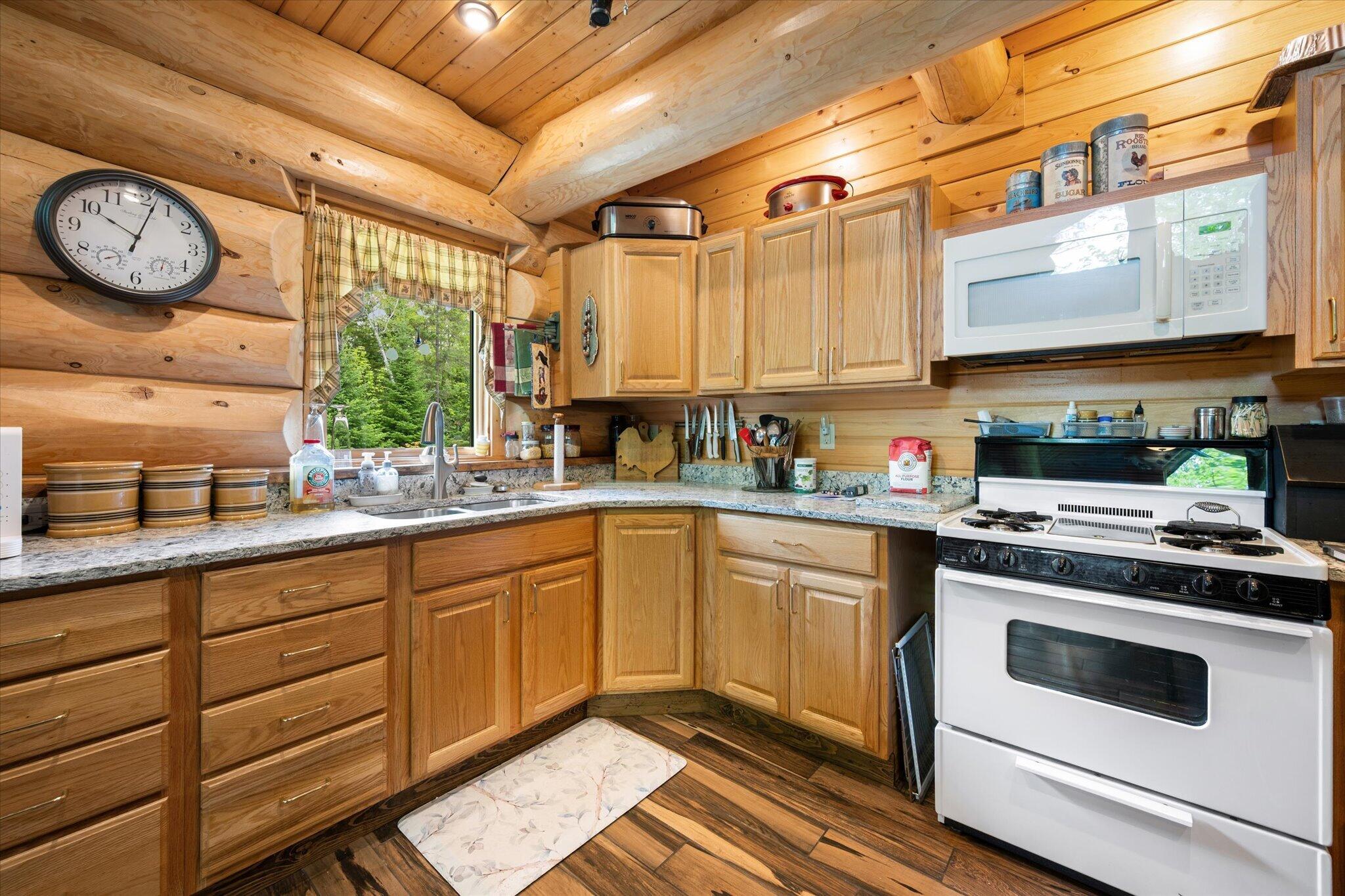 314 Atwood Pond Road Patten, ME 04765 - Photo 17 of 76 Kitchen w/granite counter tops...