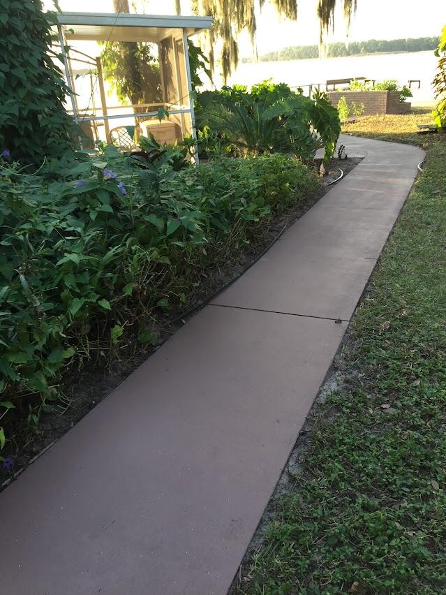 309 Oak Road Sebring, FL 33875 - Photo 31 of 39 Pathway to Dock