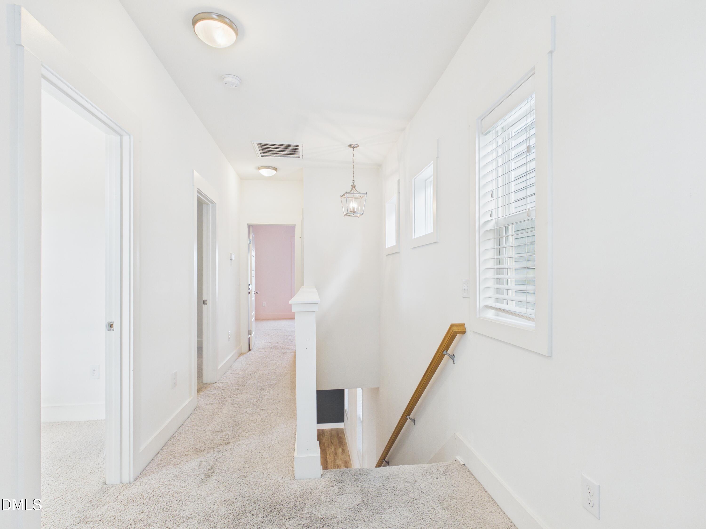 748 Groveview Wendell, NC 27591 - Photo 22 of 38 a view of a hallway with staircase