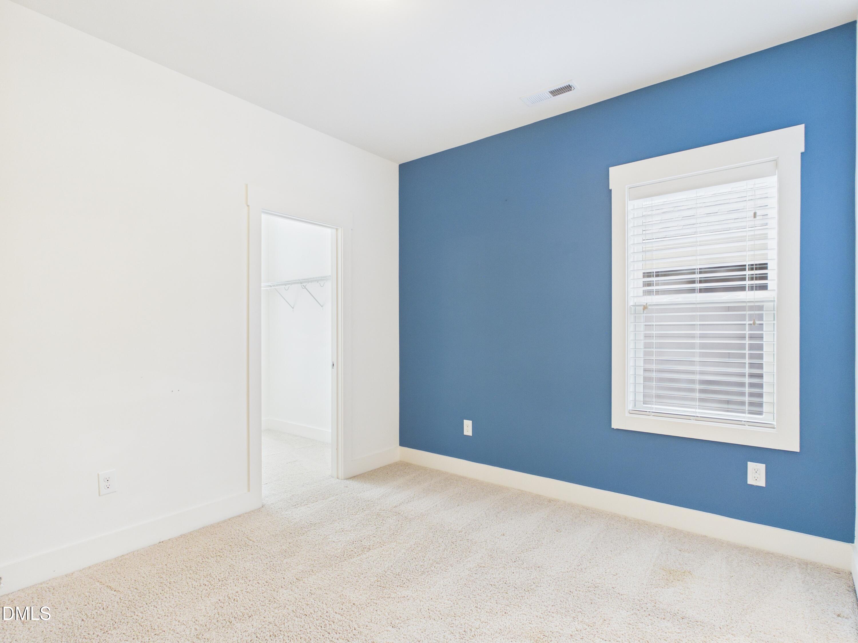 748 Groveview Wendell, NC 27591 - Photo 25 of 38 a view of an empty room with a window