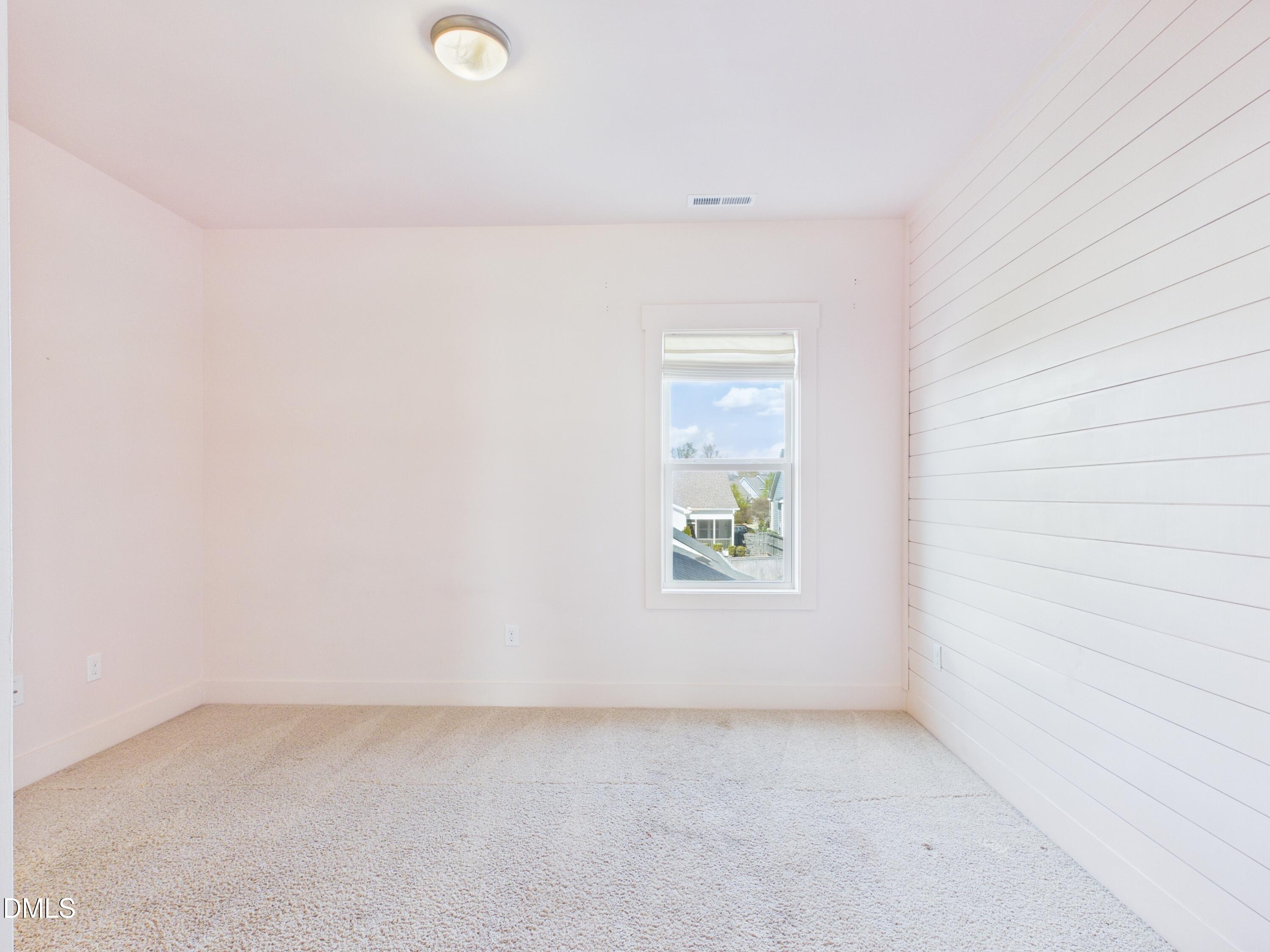 748 Groveview Wendell, NC 27591 - Photo 31 of 38 a view of an empty room and window