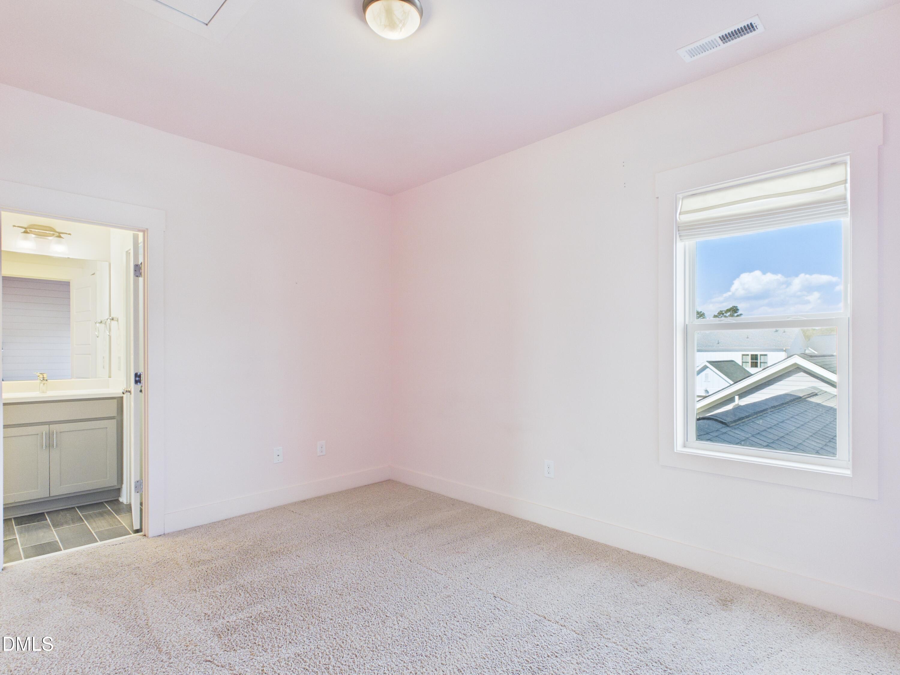 748 Groveview Wendell, NC 27591 - Photo 32 of 38 an empty room with a window