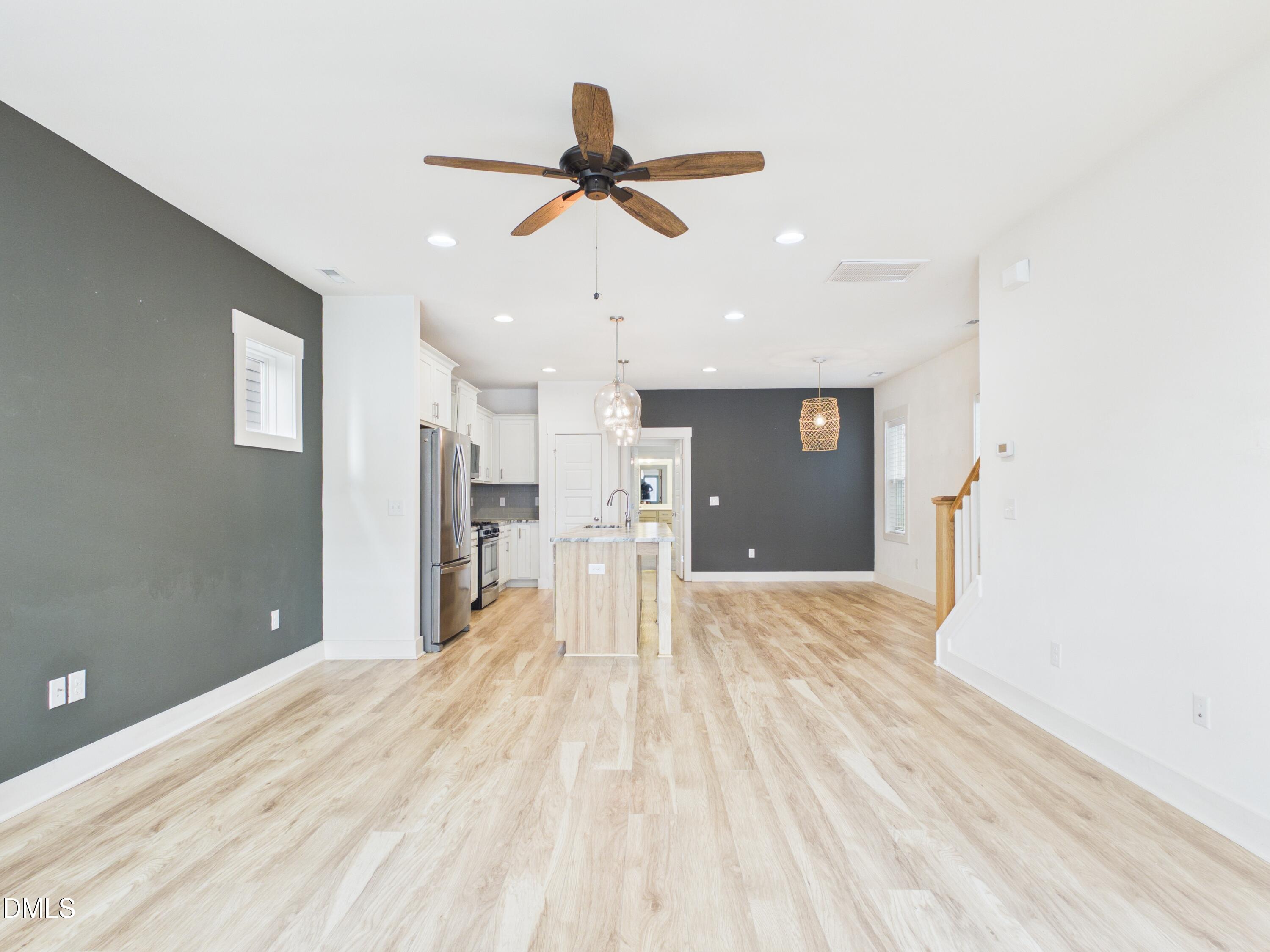 748 Groveview Wendell, NC 27591 - Photo 6 of 38 a view of a living room with a ceiling fan