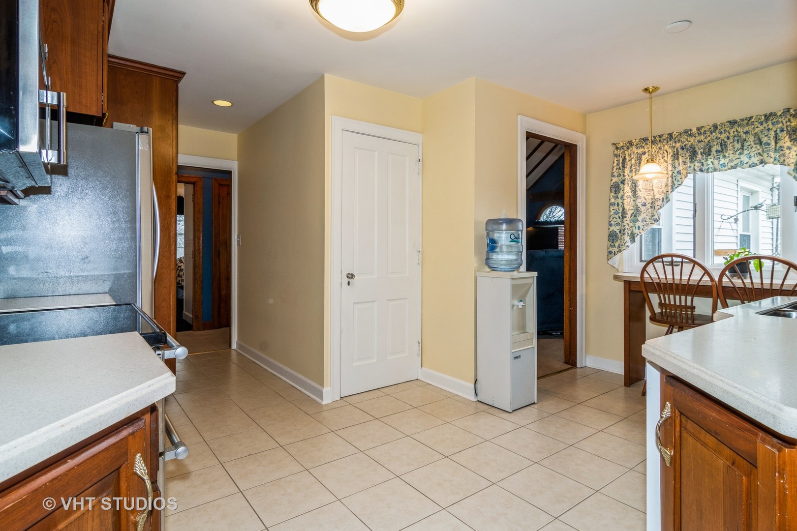 45W616 Keslinger Road Maple Park, IL 60151 - Photo 11 of 36 a kitchen with stainless steel appliances kitchen island granite countertop a refrigerator and a stove