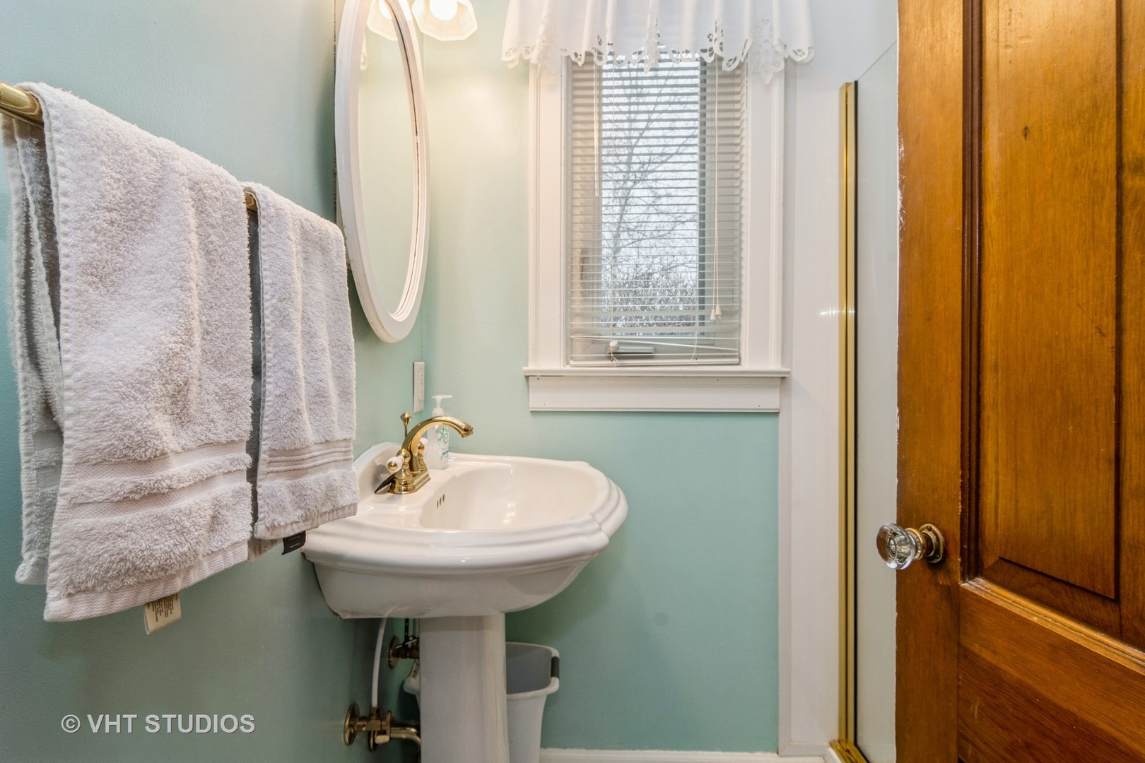 45W616 Keslinger Road Maple Park, IL 60151 - Photo 17 of 36 a bathroom with a sink and a mirror