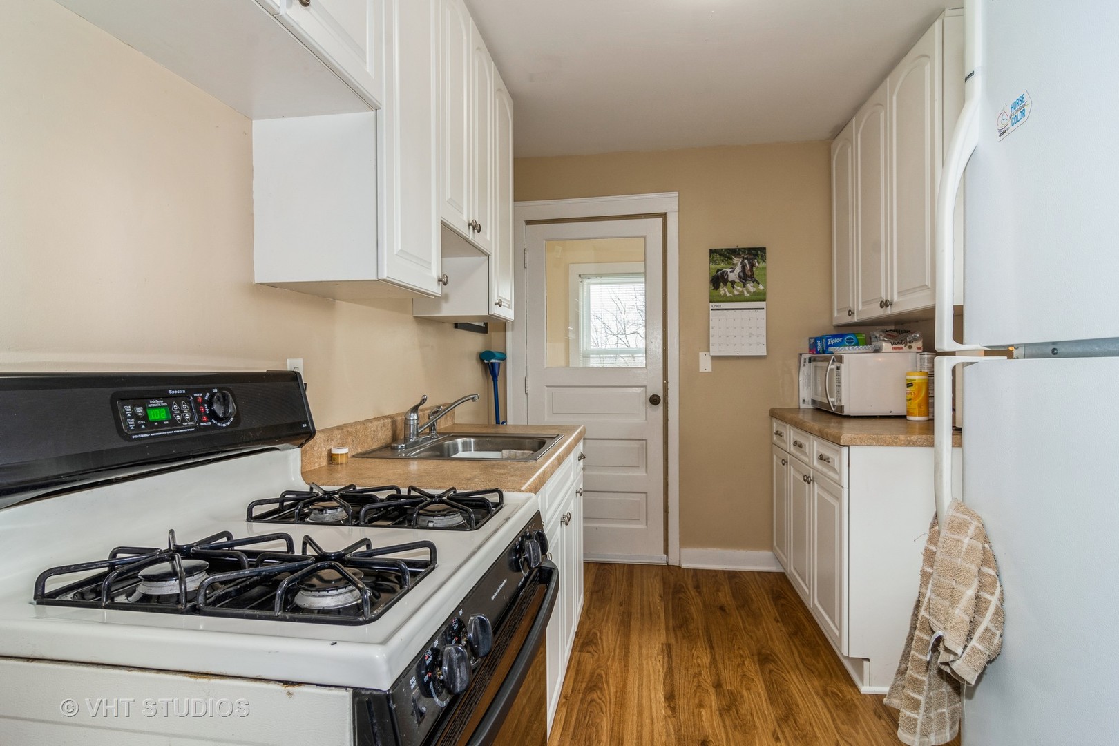 45W616 Keslinger Road Maple Park, IL 60151 - Photo 21 of 36 a kitchen with a stove and a refrigerator