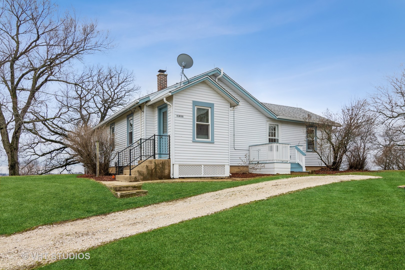 45W616 Keslinger Road Maple Park, IL 60151 - Photo 4 of 36 a front view of house with yard and green space