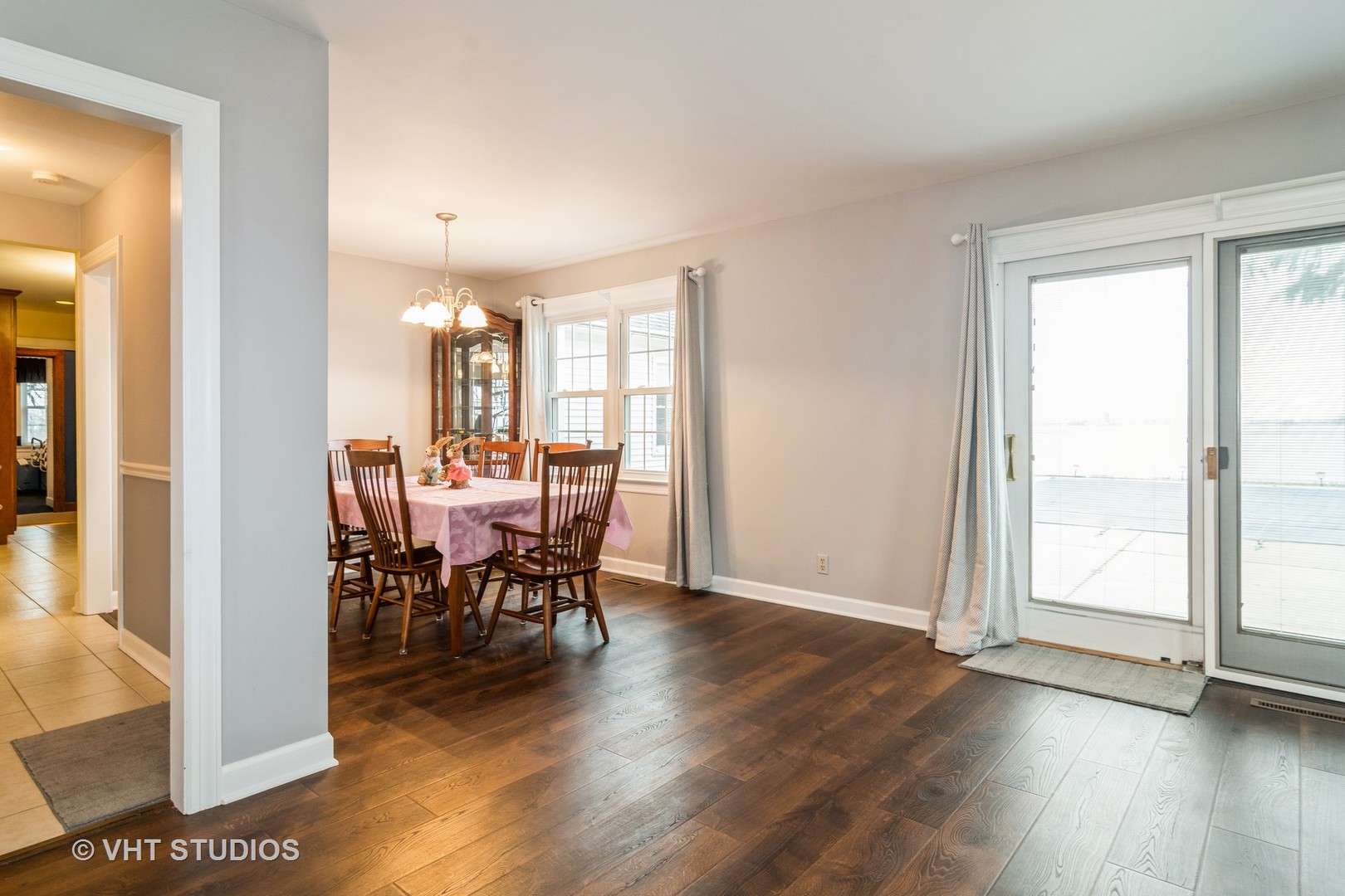 45W616 Keslinger Road Maple Park, IL 60151 - Photo 7 of 36 a view of a dining room with furniture and wooden floor