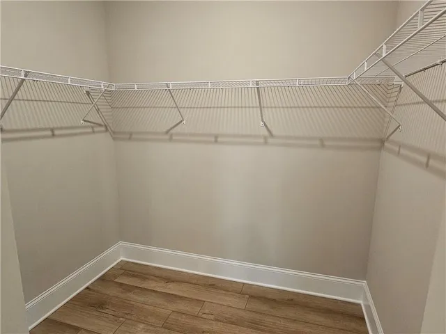 a view of a room with racks on the wall