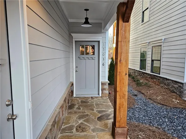 a view of a park with large trees