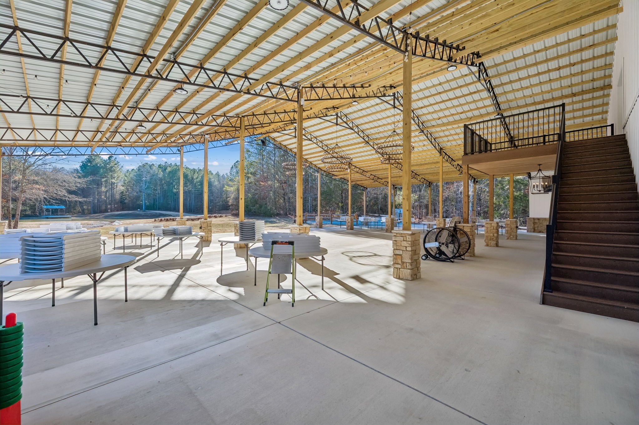 3400 Allsboro Road Cherokee, AL 35616 - Photo 14 of 100 a view of a patio with table and chairs and potted plants