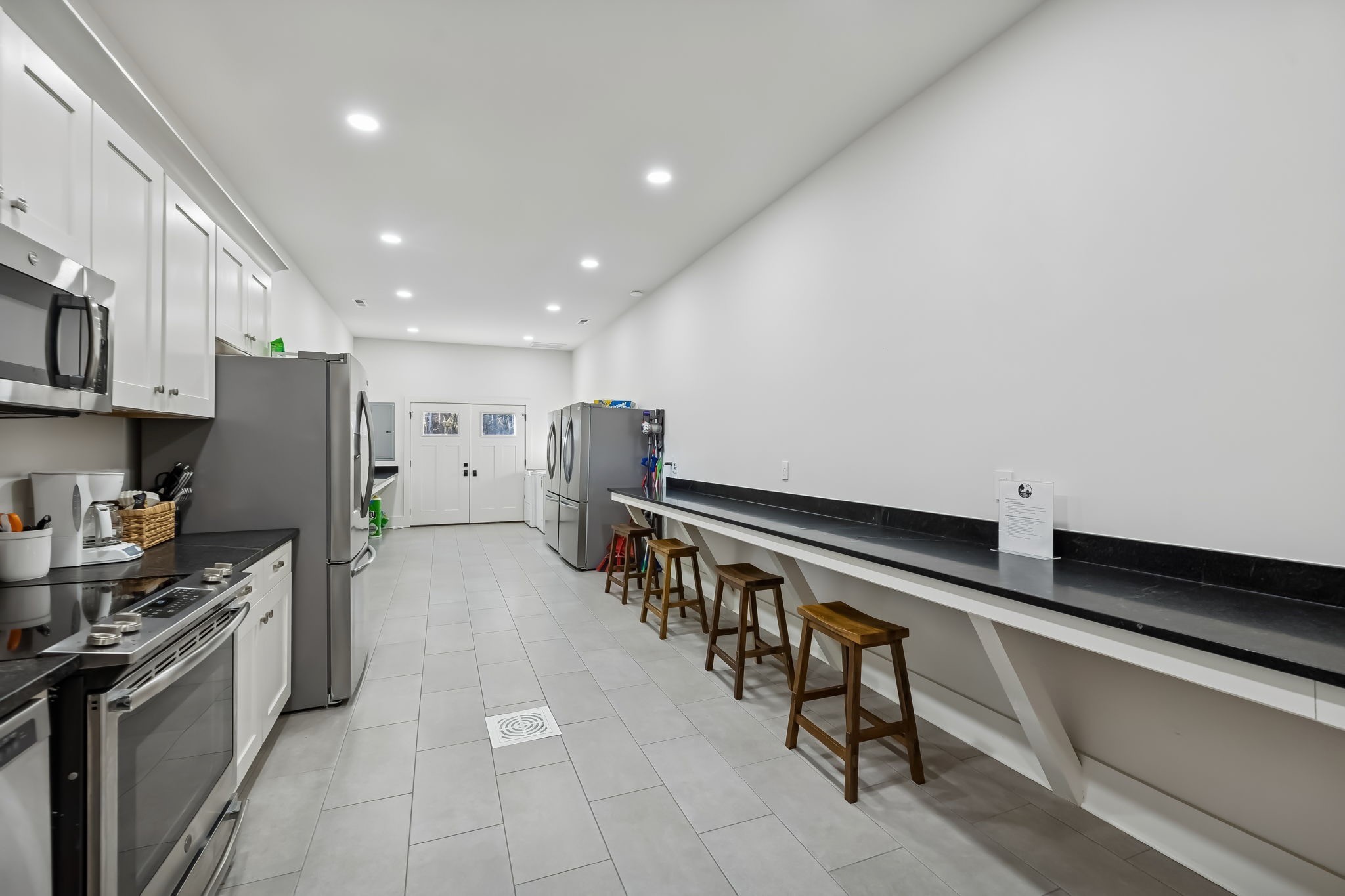 3400 Allsboro Road Cherokee, AL 35616 - Photo 25 of 100 a kitchen with stainless steel appliances a refrigerator and a stove top oven