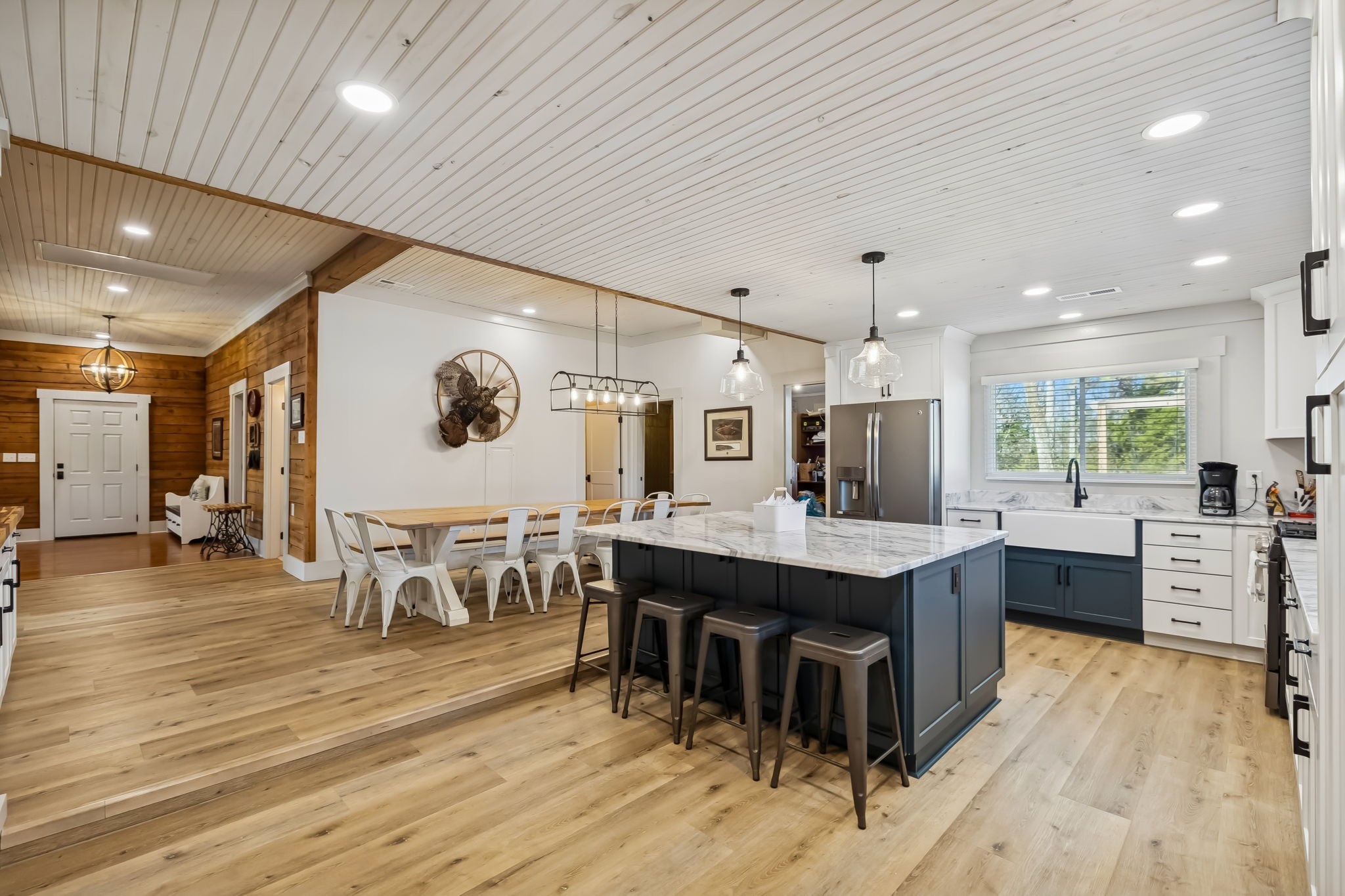 3400 Allsboro Road Cherokee, AL 35616 - Photo 48 of 100 a large dining hall with stainless steel appliances granite countertop a stove oven and a dining table with wooden floors