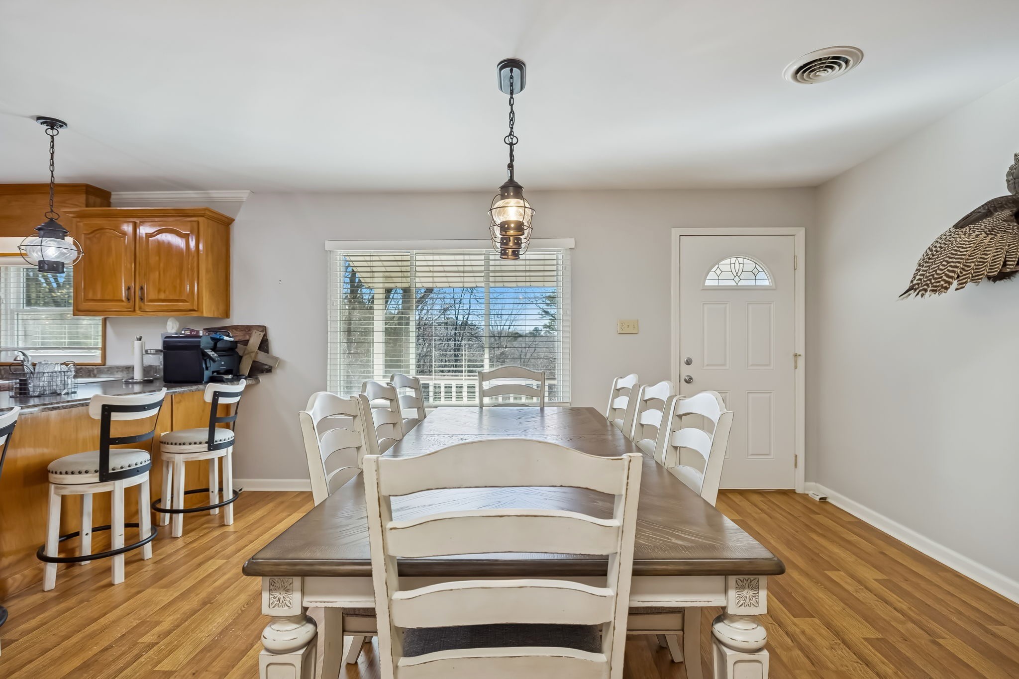 3400 Allsboro Road Cherokee, AL 35616 - Photo 63 of 100 a dining room with furniture a chandelier and wooden floor