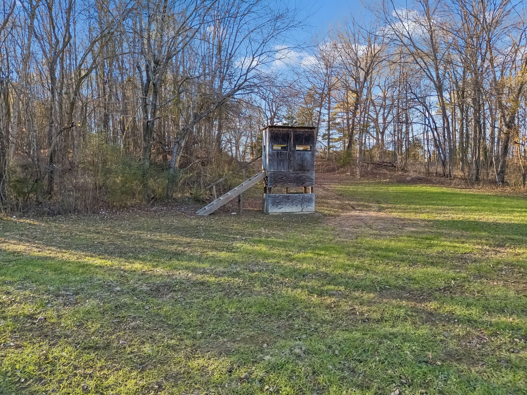 3400 Allsboro Road Cherokee, AL 35616 - Photo 80 of 100 a backyard of a house with table and chairs