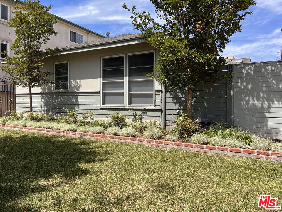 8903 Ramsgate Avenue Los Angeles, CA 90045 - Photo 2 of 15 a front view of house with yard