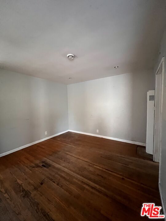 8903 Ramsgate Avenue Los Angeles, CA 90045 - Photo 8 of 15 a view of empty room with wooden floor