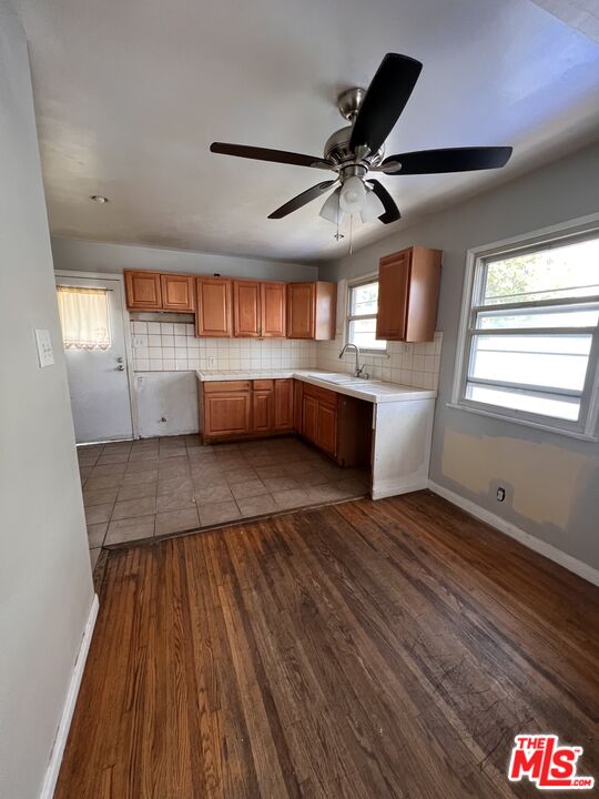 8903 Ramsgate Avenue Los Angeles, CA 90045 - Photo 9 of 15 a living room with stainless steel appliances wooden floors and view living room