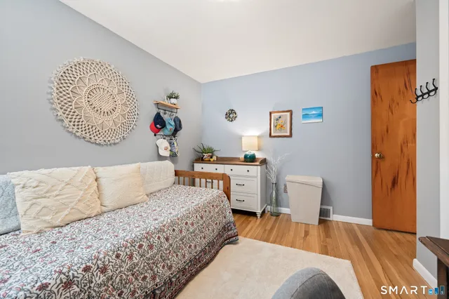 a bed room with a bed and a couch