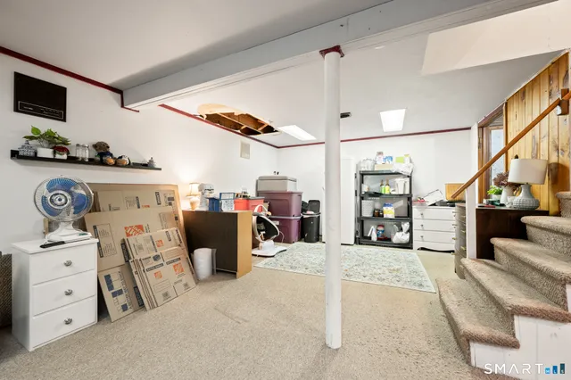 a view of livingroom with furniture and toys