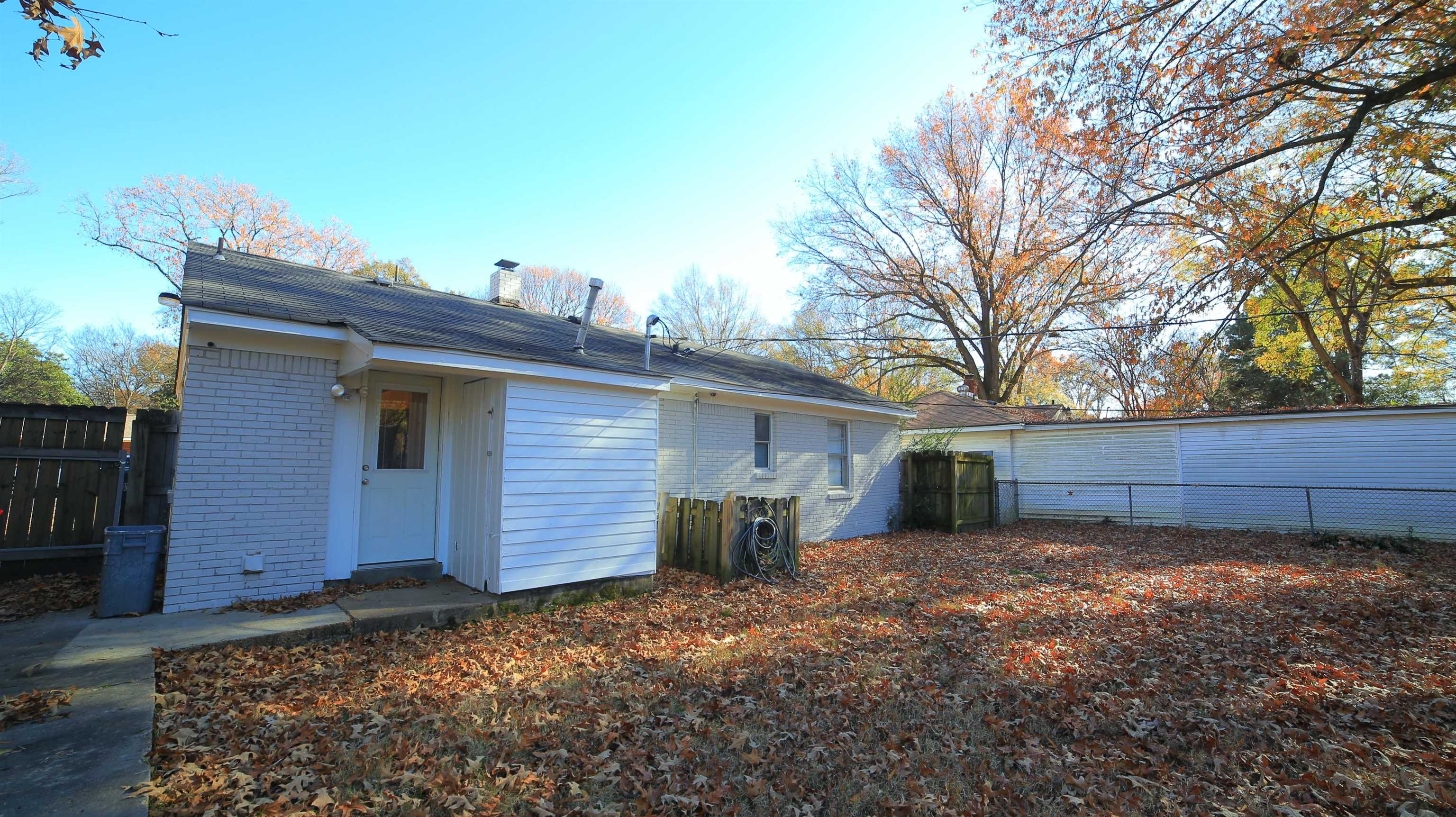 1605 Marcia Road Memphis, TN 38117 - Photo 12 of 15 a view of a house with a back yard
