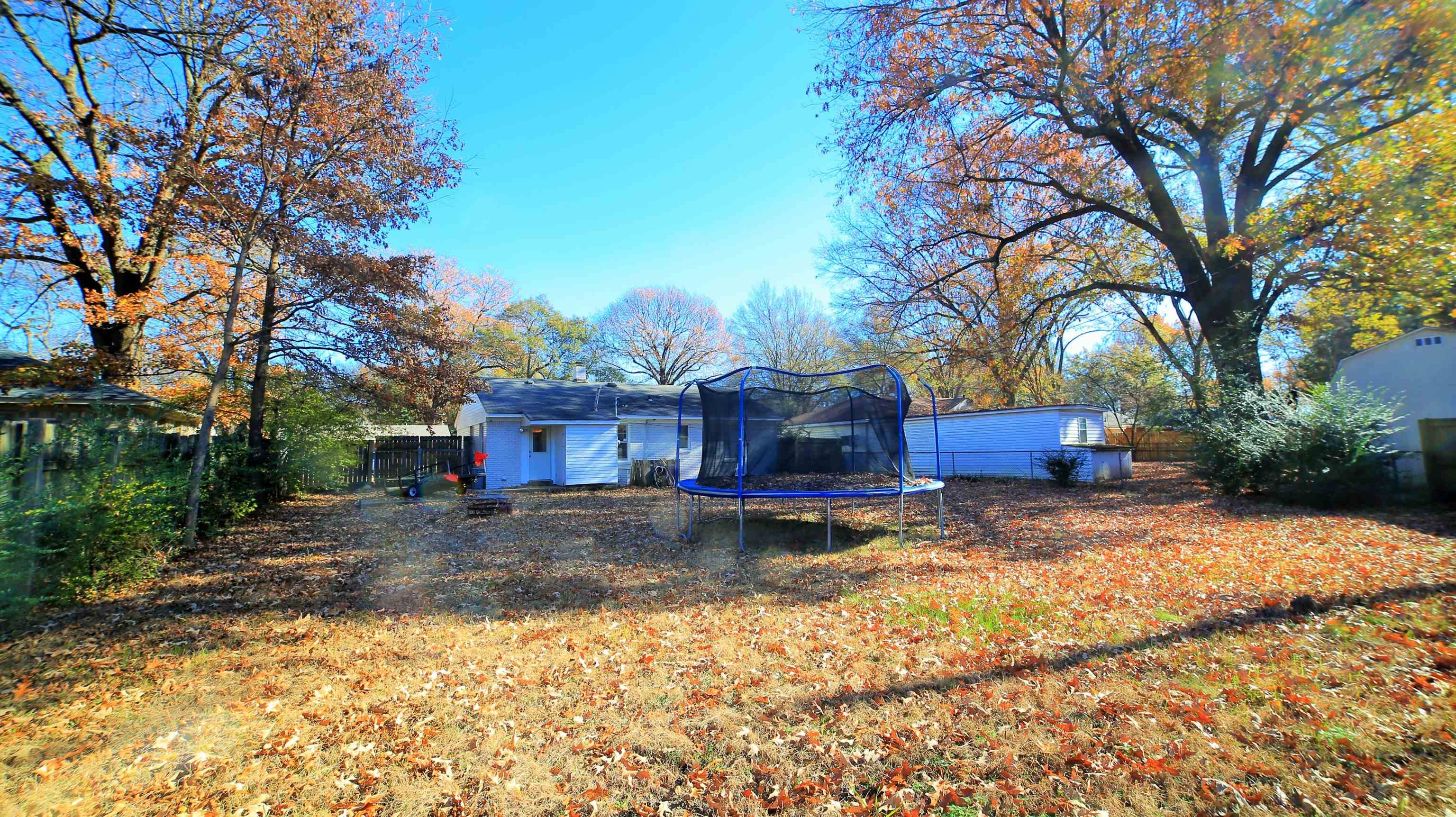 1605 Marcia Road Memphis, TN 38117 - Photo 15 of 15 a view of a house with a yard covered in snow