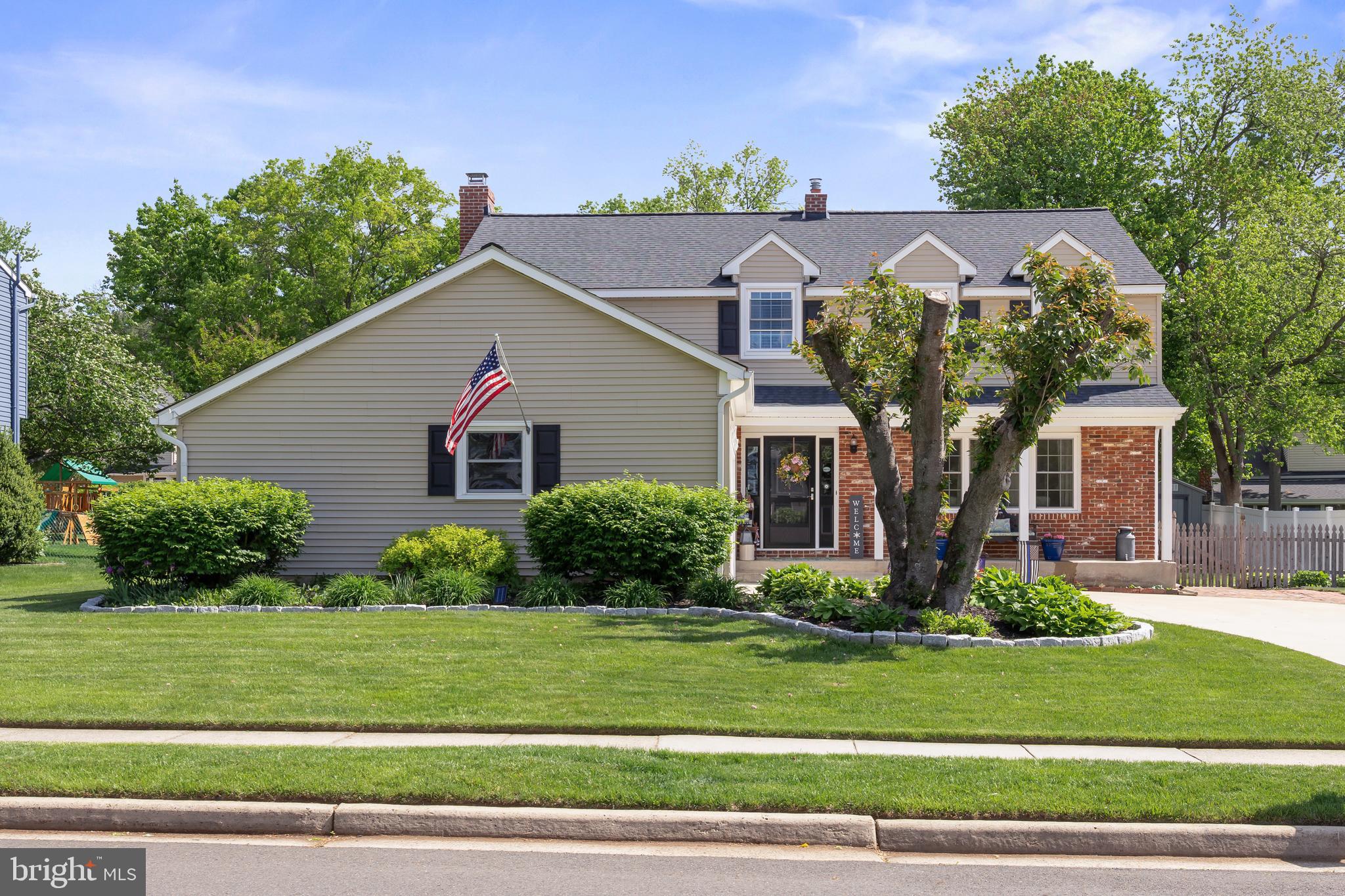 701 Decatur Drive Mount Laurel, NJ 08054 - Photo 2 of 36 a front view of a house with a yard