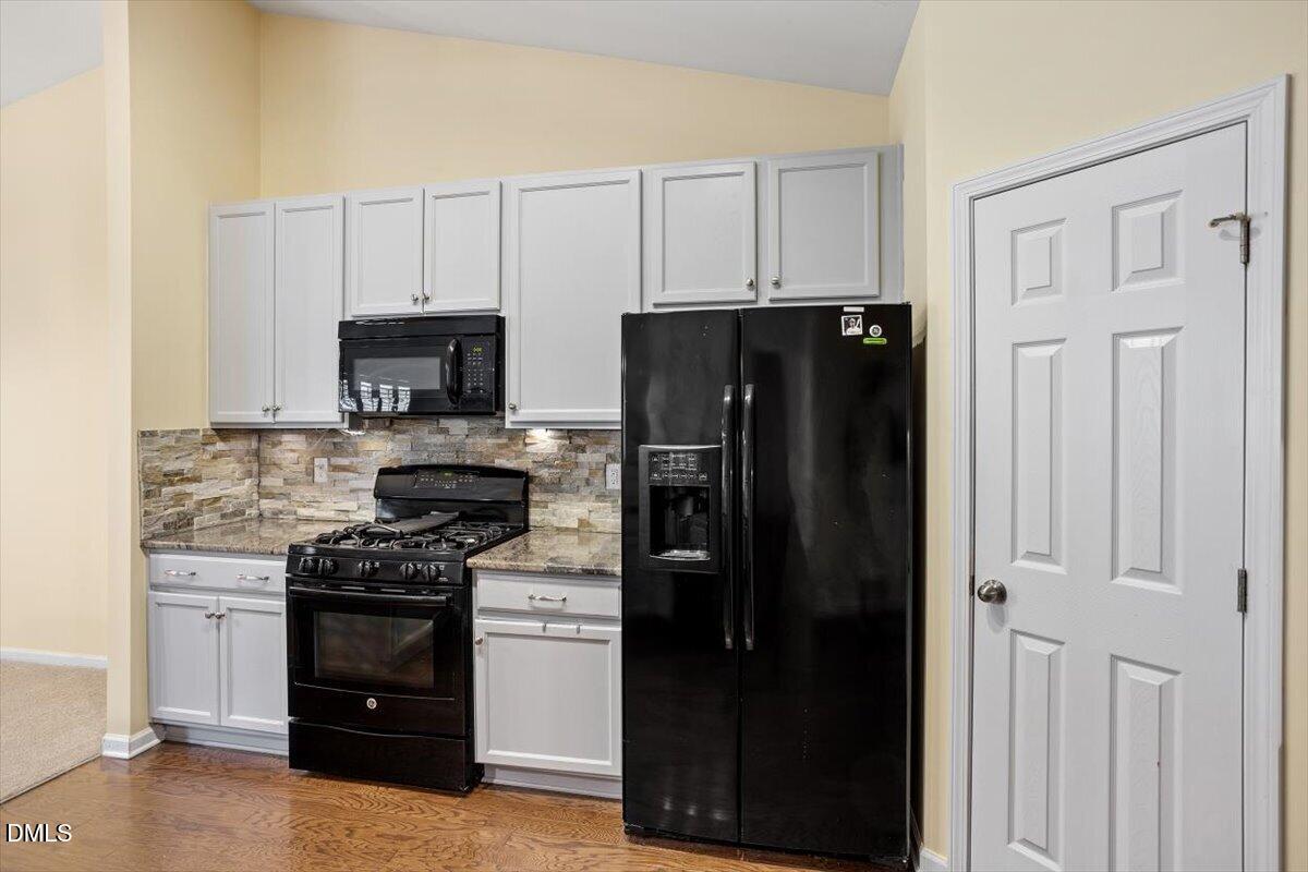115 Hidden Fox Path Garner, NC 27529 - Photo 6 of 20 Walk in pantry for extra storage
