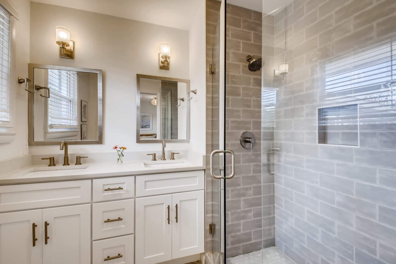 1005 A Mitchell Road Nashville, TN 37206 - Photo 11 of 23 a bathroom with a double vanity sink mirror and shower