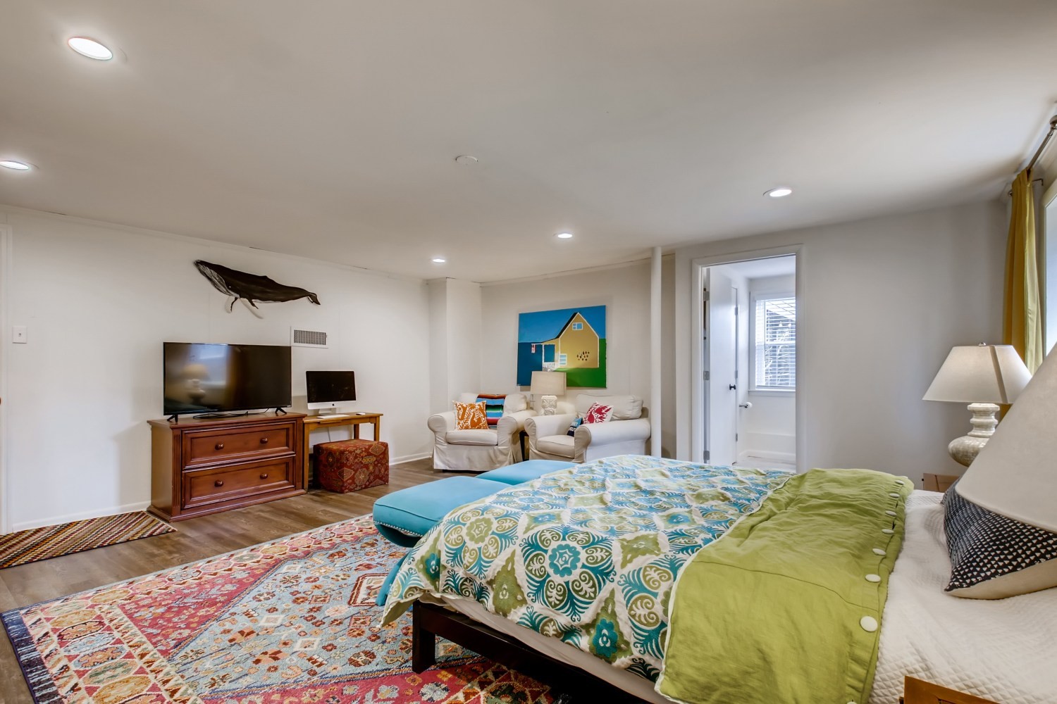 1005 A Mitchell Road Nashville, TN 37206 - Photo 17 of 23 a bed room with a bed a television and a couch