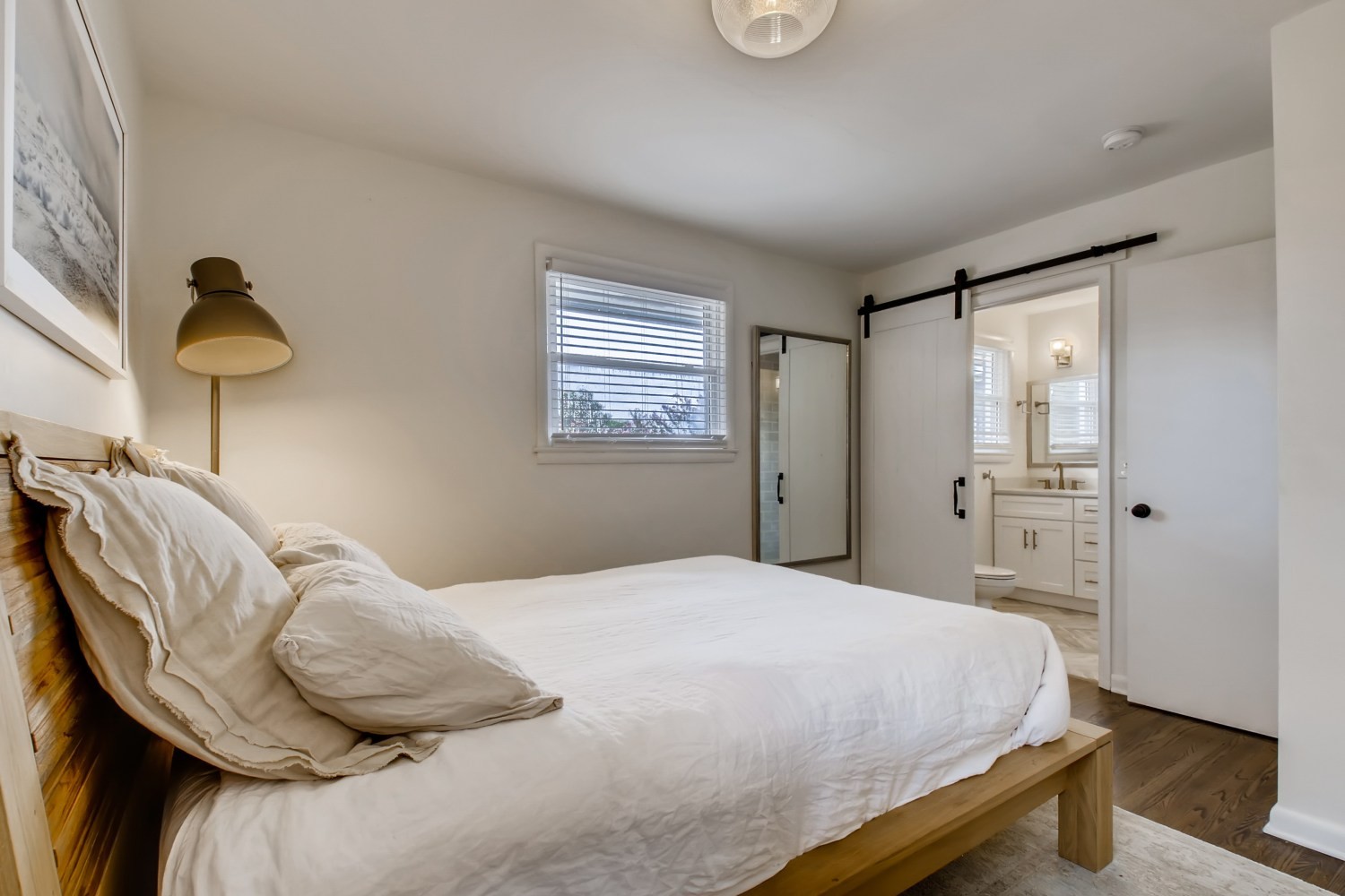 1005 A Mitchell Road Nashville, TN 37206 - Photo 10 of 23 a bedroom with a bed and wooden floor