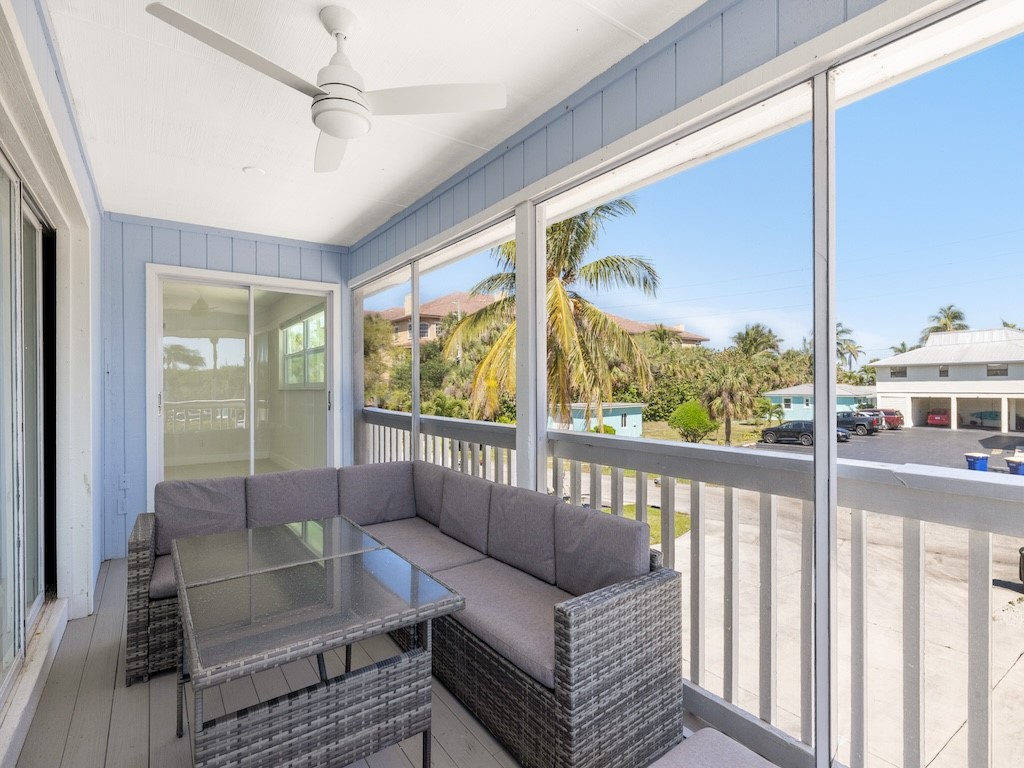 741 Hernando Street Fort Pierce, FL 34949 - Photo 36 of 36 a living room with furniture and a floor to ceiling window