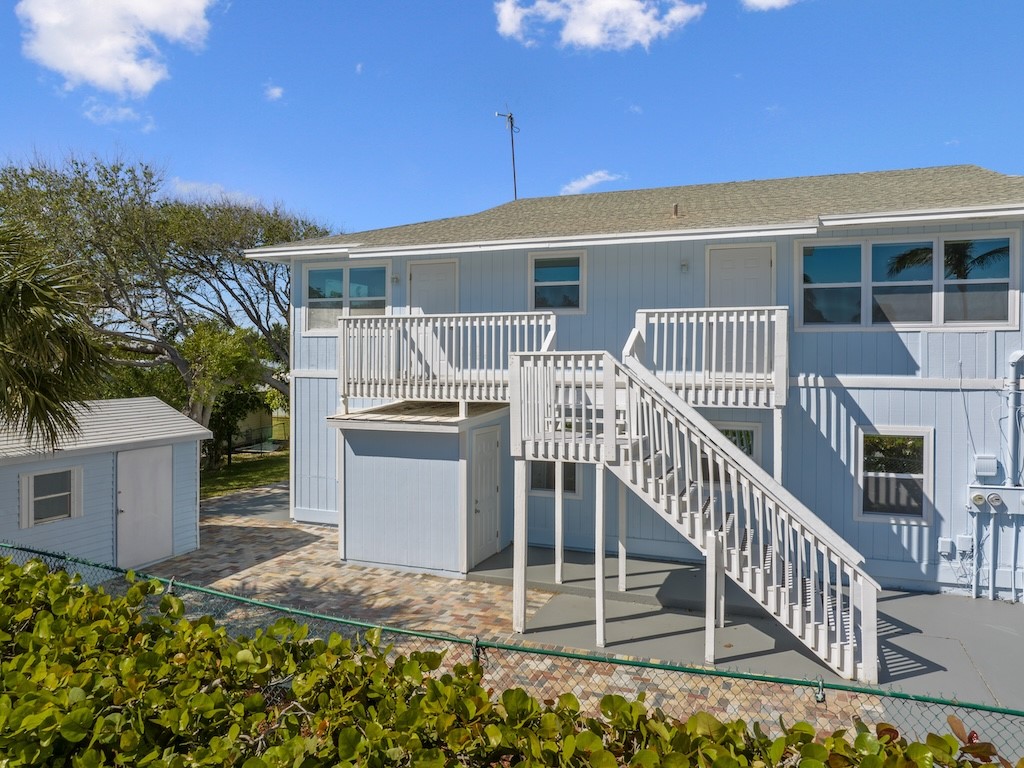 741 Hernando Street Fort Pierce, FL 34949 - Photo 4 of 36 a view of a house with backyard and deck