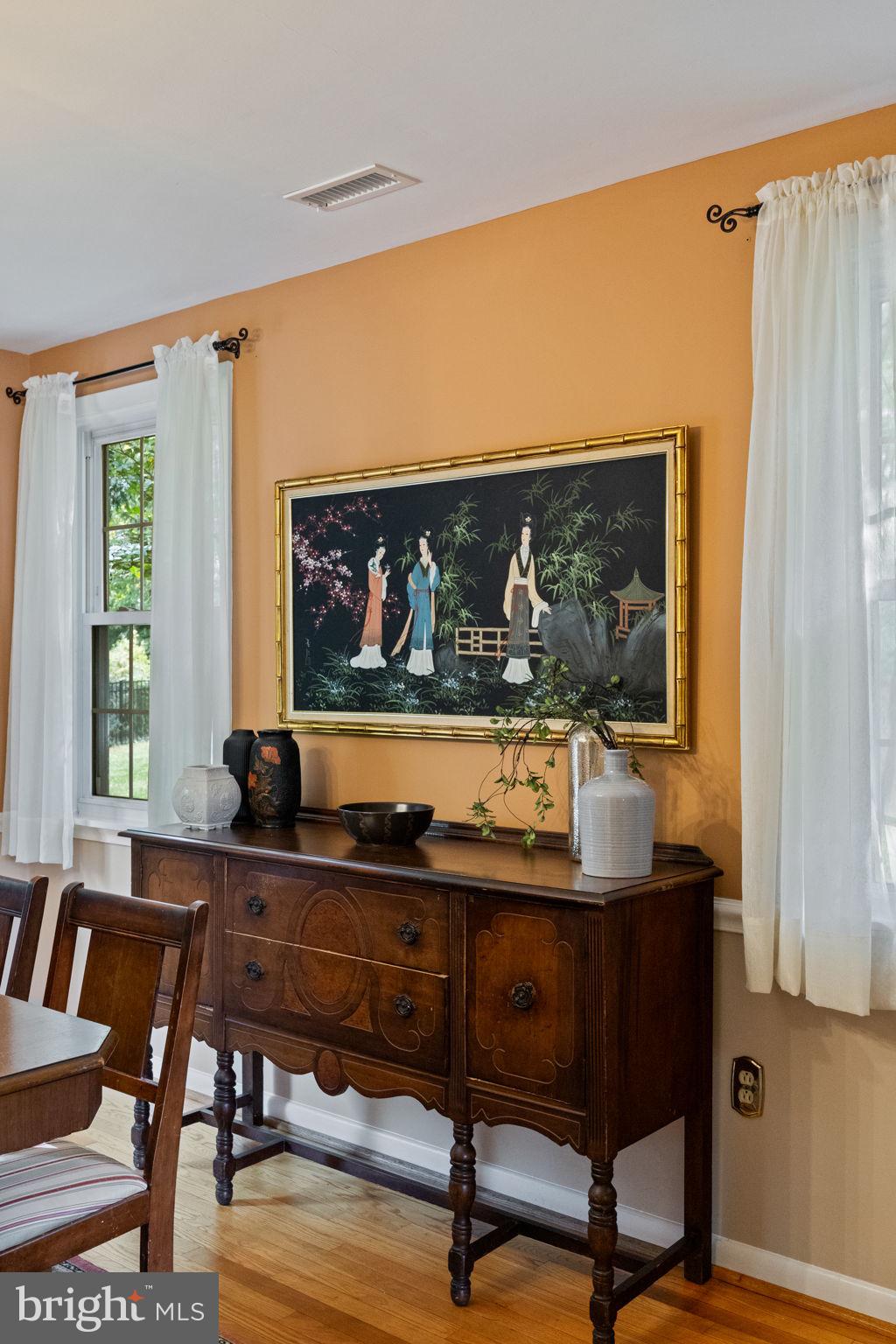 1014 Townsend Circle Wayne, PA 19087 - Photo 15 of 68 a living room with a table and a painting on the wall