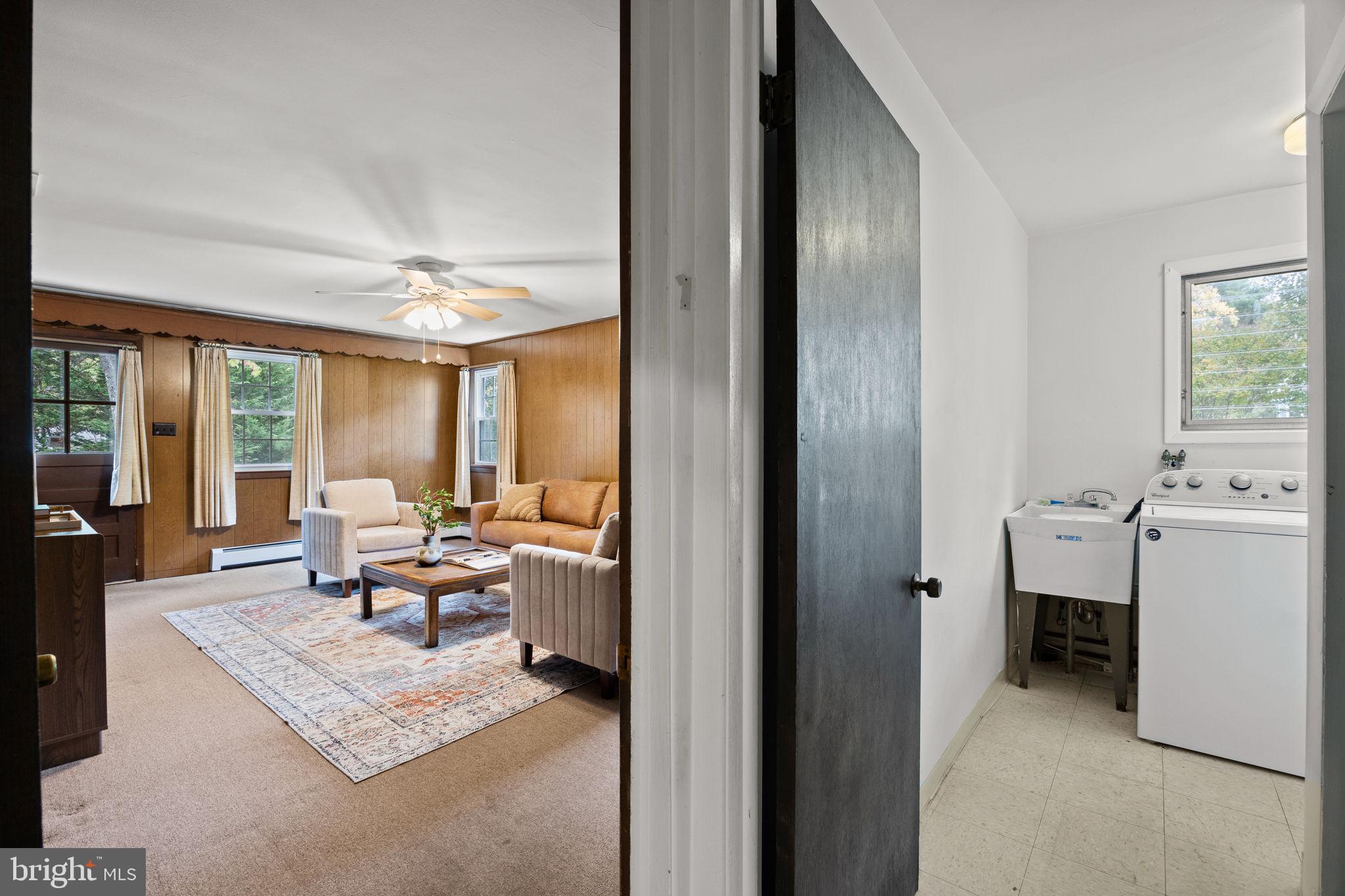 1014 Townsend Circle Wayne, PA 19087 - Photo 25 of 68 a living room with furniture and a fireplace