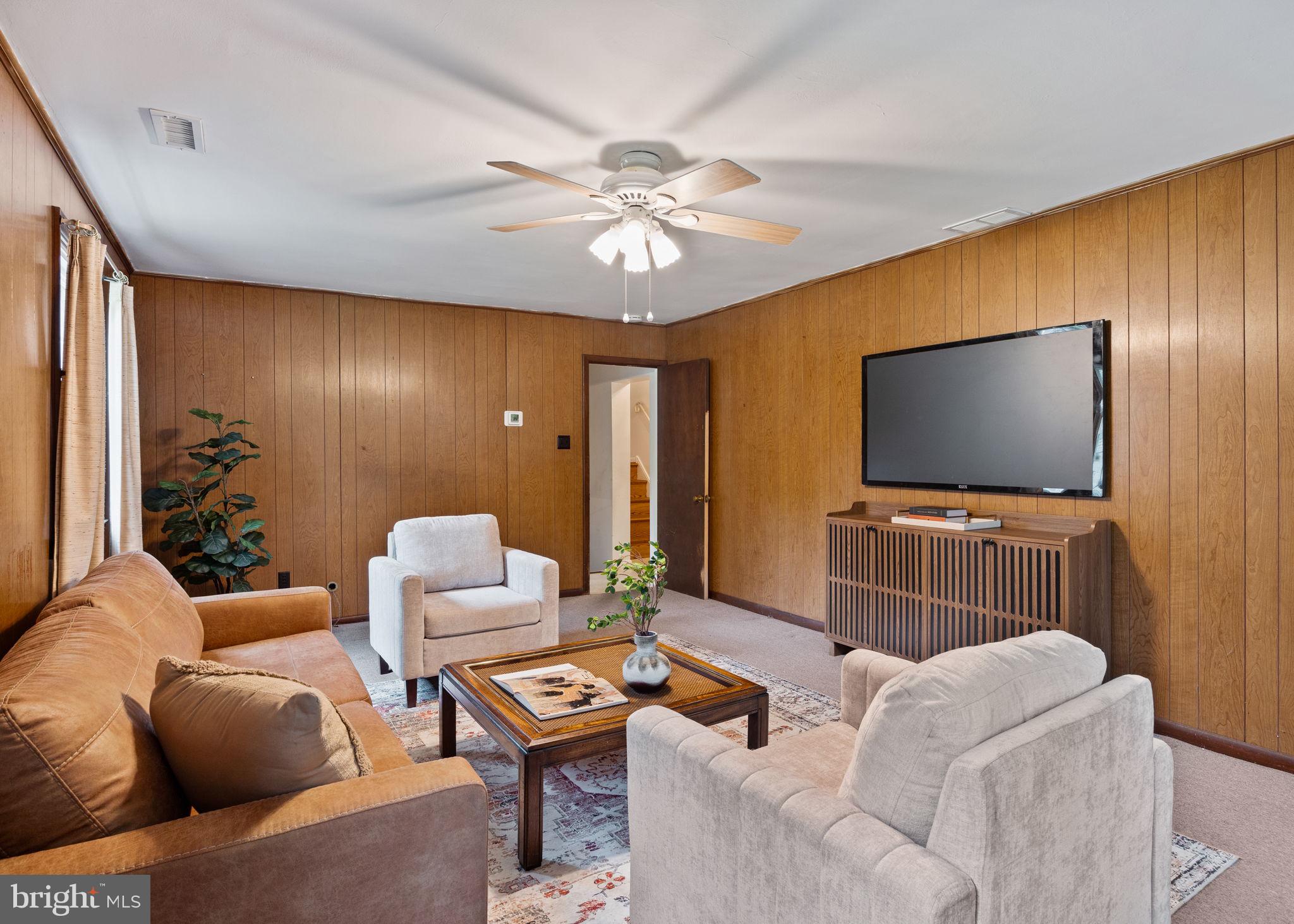 1014 Townsend Circle Wayne, PA 19087 - Photo 27 of 68 a living room with furniture and a flat screen tv