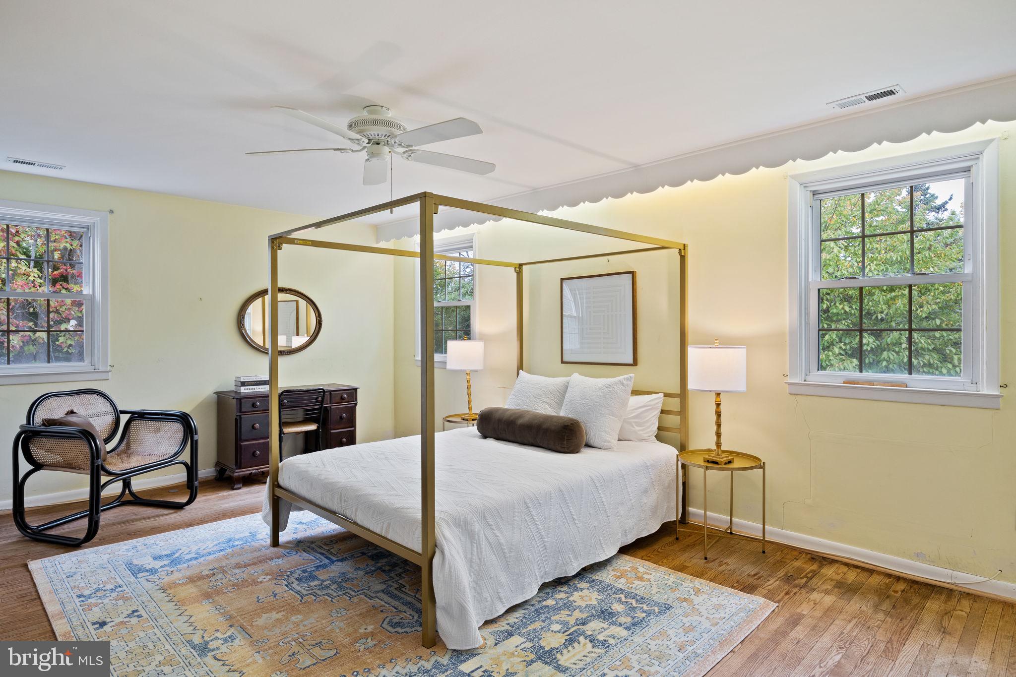 1014 Townsend Circle Wayne, PA 19087 - Photo 35 of 68 a bedroom with a bed a dresser and chair