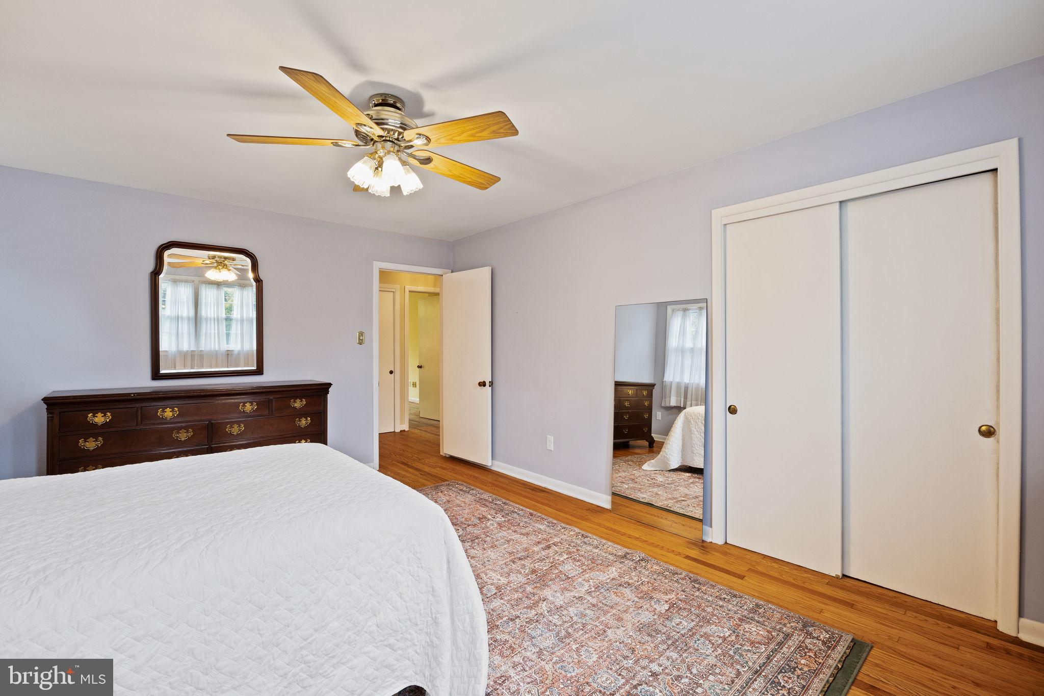 1014 Townsend Circle Wayne, PA 19087 - Photo 43 of 68 a bedroom with a bed and wooden floor