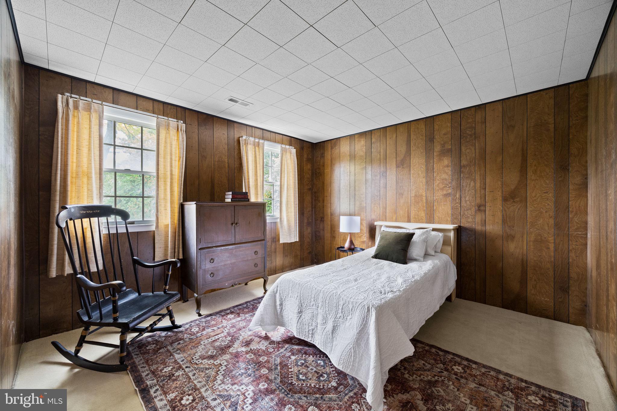 1014 Townsend Circle Wayne, PA 19087 - Photo 49 of 68 a bedroom with a bed windows and chair