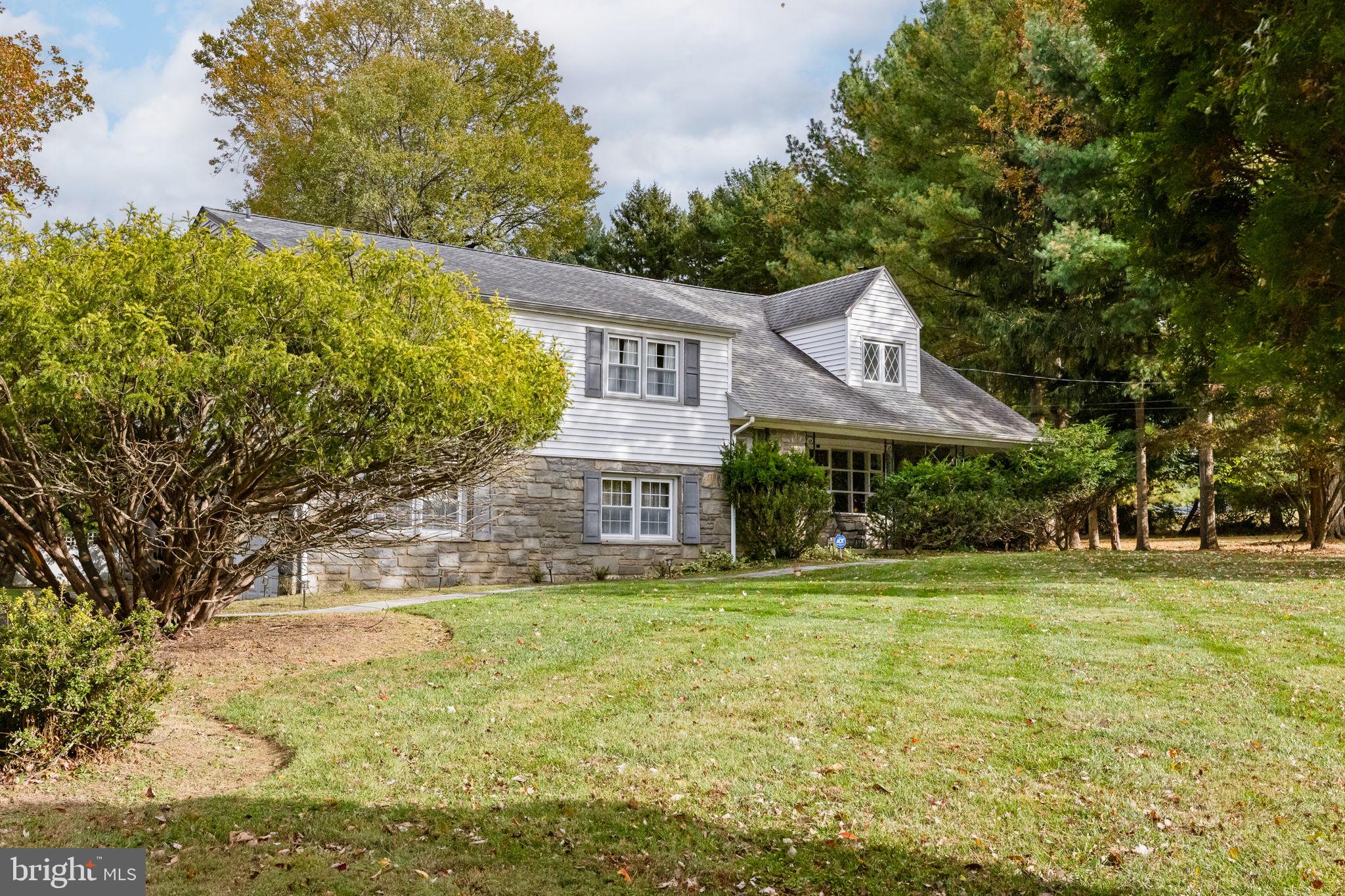 1014 Townsend Circle Wayne, PA 19087 - Photo 54 of 68 a front view of a house with a yard
