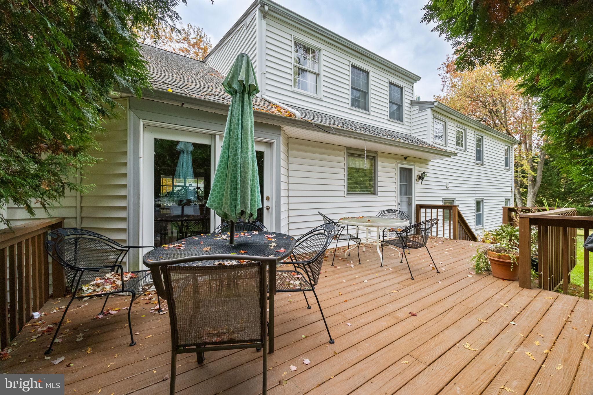 1014 Townsend Circle Wayne, PA 19087 - Photo 60 of 68 a view of a house with chairs and table on the wooden floor