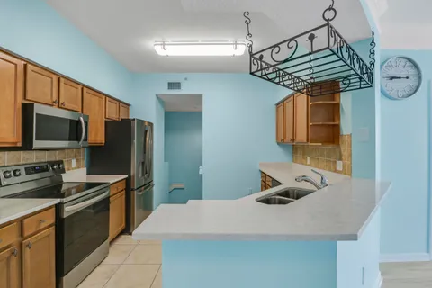 a kitchen with a sink and a cabinets