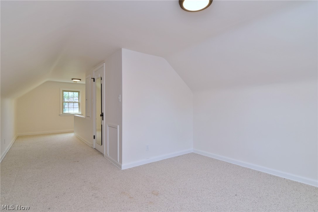 2564 Fenwick Road Cleveland, OH 44118 - Photo 36 of 46 Third Floor - carpet flooring and lofted ceiling
