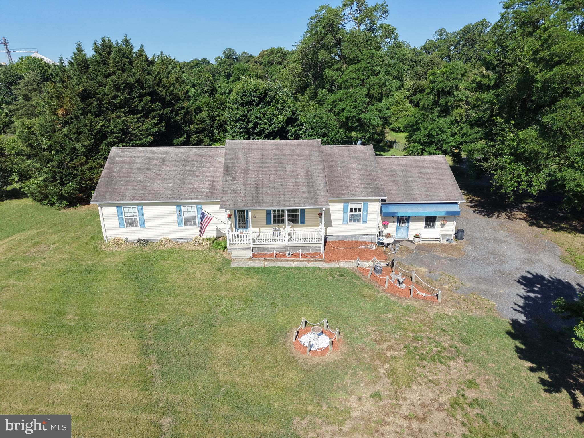 7112 East New Market Ellwood Road Hurlock, MD 21643 - Photo 39 of 41 an aerial view of a house with swimming pool and garden