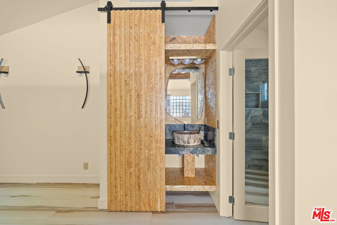 621 Rose Avenue, Unit 623 1/2 Venice, CA 90291 - Photo 8 of 10 a bathroom with a shower